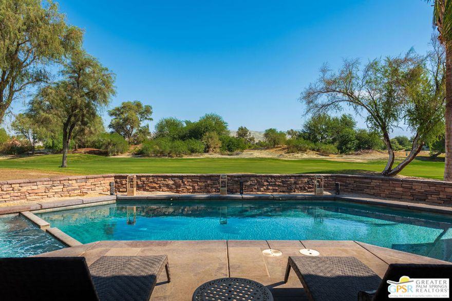 Set against the backdrop of the Mission Hills North Gary Player Signature Course, this beautifully appointed Home offers the perfect blend of Luxury and Comfort in Rancho Mirage's prestigious Mira Vista community. Designed with both relaxation and entertaining in mind, the home features over 4,000 sq. ft. of living space, 4 bedrooms, and 4 baths. A dramatic rotunda entrance opens to soaring ceilings and an inviting great room with a fireplace and custom bar. The gourmet kitchen is finished with granite countertops and connects seamlessly to the dining area, creating an ideal space for gatherings of any size. The primary suite enjoys sweeping fairway views and a spa-like bath with dual vanities, walk-in shower, and soaking tub. Three additional ensuite bedrooms provide privacy and comfort for family and guests. Step outdoors to experience true desert living. The backyard showcases a sparkling pebble-finish, salt water filtration pool and spa, a built-in BBQ, a fire feature, and a covered patio with golf course and mountain views perfect for dining under the stars. For ultimate comfort on warm days, an outdoor misting system provides a refreshing breeze. This residence also offers a 3-car garage, enhancing convenience and curb appeal, with the added benefit of an EV charger for electric vehicle owners. Offered TURNKEY Furnished, the home is available for both seasonal and long-term leasing. Mira Vista residents enjoy resort-style amenities including a heated community pool and spa, tennis and pickleball courts, cable/internet service, and 24-hour guard-gated security. Conveniently located near world-class shopping, dining, the Agua Caliente Resort & Casino, and upcoming destinations such as Disney's Cotino PLUS easy day trips to Joshua Tree, Big Bear, and the Pacific coast. This prime location is also just minutes from Eisenhower Medical Center, offering peace of mind and convenience for medical professionals or those seeking proximity to top-tier healthcare. This home captures the best of desert lifestyle living. Rental Rates: $10,000/month (April-December) and $12,000/month (January-March). Available for seasonal or long-term lease.