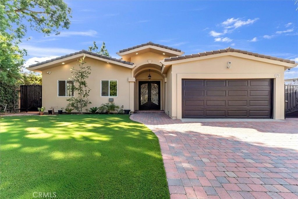 Photo of 5701 Wish Avenue, Encino, CA 91316 (MLS # SR25235692)