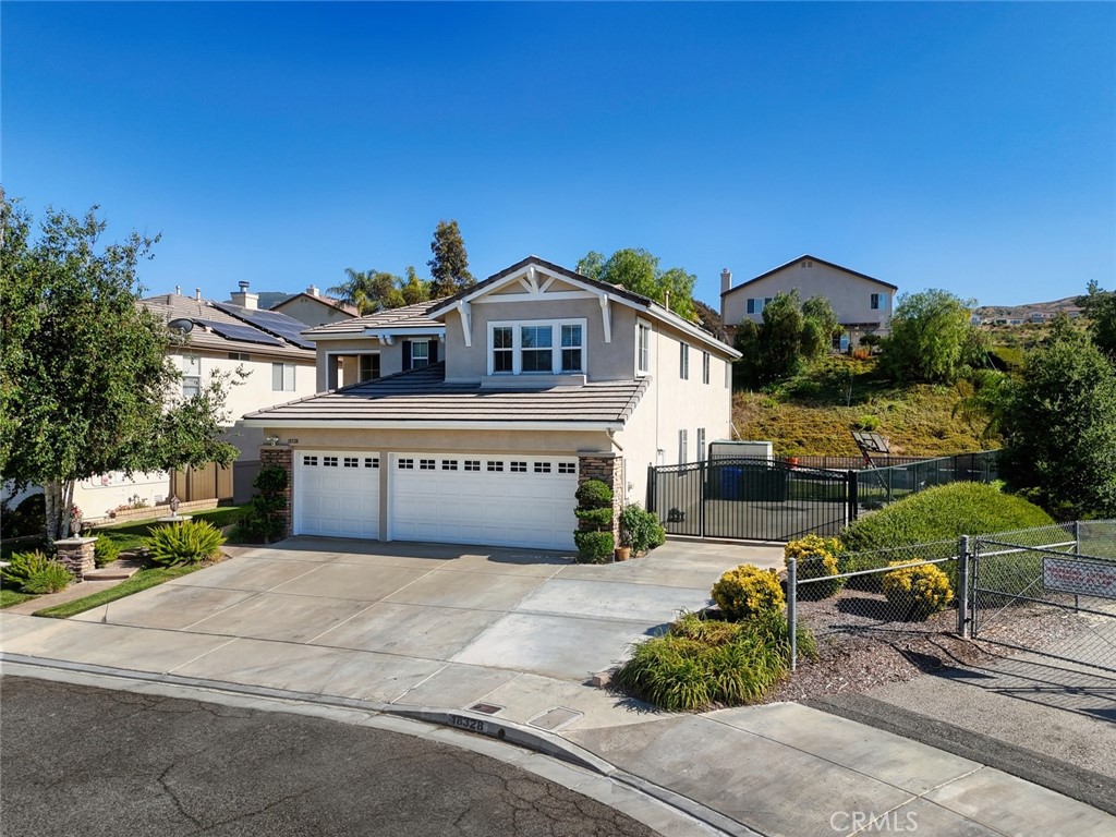 Welcome to 18328 Nightingale Court — a stunning 5-bedroom, 3-bathroom pool home nestled on a peaceful cul-de-sac in one of Canyon Country’s most sought-after neighborhoods. Set on an expansive 11,761 sq ft corner lot, this beautifully maintained residence spans approximately 3,192 sq ft and checks every box for comfort, function, and California living at its finest.
Enter through the grand foyer into a bright and airy layout featuring soaring ceilings, a formal living and dining room, and an inviting family room with a cozy fireplace. The kitchen is a chef’s dream, boasting granite countertops, a large center island, stainless steel appliances, ample cabinetry, and a walk-in pantry—perfect for both entertaining and everyday living.
With five spacious bedrooms and possible sixth bedroom/ bonus Room upstairs, including a main-level bedroom and full bath, this home offers excellent flexibility for guests or multigenerational living. Upstairs, the luxurious primary suite features dual walk-in closets and a spa-like ensuite bathroom with soaking tub, separate shower, and dual vanities. Three additional bedrooms upstairs, including an additional bonus room, are generously sized and share a full hallway bath.
Step outside to your private resort-style backyard, where a sparkling pool and spa await—perfect for summer fun or relaxing evenings under the stars. The yard also offers low-maintenance landscaping, natural grass, and ample space for dining and lounging.
Don’t miss this rare opportunity to own a turnkey solar-powered pool home with RV parking in the heart of Canyon Country!