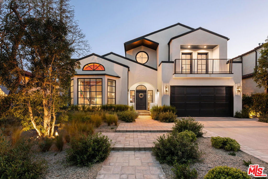 This stunning, newly updated California Traditional home in Gillette Square blends classic architectural elements with modern-day finishes to create a warm, sophisticated living experience. Located on the west side of the street, this over 6,600 SF residence offers exceptional value for any buyer. Upon entering, the dramatic foyer and spiral staircase immediately set the tone, leading into the thoughtfully designed interiors beyond. To the left, a sun-drenched formal living room boasts soaring vaulted ceilings and a charming fireplace, creating an inviting space for gatherings. The adjacent dining room, connected by a wet bar, flows effortlessly into the heart of the home, a beautifully appointed kitchen featuring rich walnut cabinetry, integrated panel-faced appliances, dual sinks, and striking Calcutta marble countertops. The kitchen opens to a spacious family room with custom built-ins and French doors leading to the backyard. A powder room is located off the main foyer, perfect for guests while entertaining. A cozy breakfast nook, anchored by a chandelier, offers direct outdoor access. The first guest bedroom with en-suite bathroom is also found on this floor, completing the main level. Upstairs, the expansive primary suite overlooks peaceful treetop views and offers a serene retreat complete with a private sitting area or office nook, a walk-in closet, and a spa-inspired bathroom with double vanities, a freestanding tub, a separate marble-clad shower, and abundant natural light. An office and three additional bedrooms are also located on this level, one with an en-suite, while the remaining two share a well-appointed full bathroom. The basement level features a versatile gym with space for a full equipment setup, two additional bedrooms with accompanying bathrooms, a laundry room, and thoughtfully placed light wells that bring natural light into the basement windows. The private, hedged backyard is an entertainer's dream, featuring a large flat turf area, built-in BBQ with bar seating beneath a pergola, and ample space for year-round enjoyment. Set on a tree-lined street in the highly sought-after North of Montana enclave and located within the Franklin School District, this turnkey residence offers exceptional value and lifestyle for the most discerning buyer.