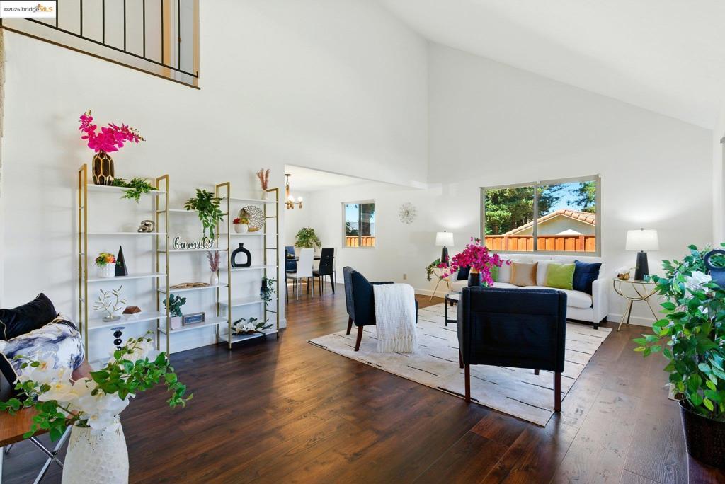 Located in the sought-after Dana Hills neighborhood of Clayton, this beautiful 4-bedroom, 3-bath home offers the perfect blend of comfort, privacy, and community charm. Step inside to discover luxury vinyl flooring throughout and a functional layout. The main level features a convenient bedroom and full bathroom—ideal for guests or multigenerational living, dinning area, living room and a family room. Upstairs, you’ll find three additional bedrooms and two full bathrooms, including a spacious primary suite. Enjoy cooking in the kitchen equipped with stainless steel appliances, and rest easy knowing the home has a brand-new roof. Outside, the generous backyard offers endless potential—whether you're dreaming of a garden, play area, or outdoor kitchen—and the shaded deck is perfect for relaxing or entertaining. Located near the community greenbelt, this home offers peace of mind with neighborhood safety, added privacy, and access to the community pool. Welcome to Dana Hills—where comfort meets convenience in a serene, well-maintained setting.