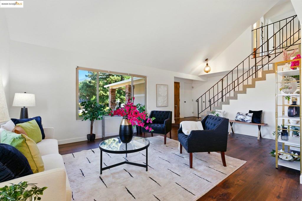 Located in the sought-after Dana Hills neighborhood of Clayton, this beautiful 4-bedroom, 3-bath home offers the perfect blend of comfort, privacy, and community charm. Step inside to discover luxury vinyl flooring throughout and a functional layout. The main level features a convenient bedroom and full bathroom—ideal for guests or multigenerational living, dinning area, living room and a family room. Upstairs, you’ll find three additional bedrooms and two full bathrooms, including a spacious primary suite. Enjoy cooking in the kitchen equipped with stainless steel appliances, and rest easy knowing the home has a brand-new roof. Outside, the generous backyard offers endless potential—whether you're dreaming of a garden, play area, or outdoor kitchen—and the shaded deck is perfect for relaxing or entertaining. Located near the community greenbelt, this home offers peace of mind with neighborhood safety, added privacy, and access to the community pool. Welcome to Dana Hills—where comfort meets convenience in a serene, well-maintained setting.