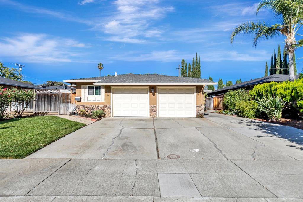 Rare find, real opportunity! An updated duplex in a prime Blossom Valley location! Unit 5687 (3/2) features crown molding, a cozy living room with fireplace and sliding door that opens to a private and beautifully sized backyard ideal for relaxing or entertaining. Unit 5689 (2/1) offers bright, contemporary finishes and a private side yard. Both units have enclosed garages, dual-pane windows throughout. Conveniently located near Westfield Mall, major highways 85/87/101, Light Rail, and Kaiser. Enjoy nearby parks and walkable access to daily essentials. Perfect to live in one unit and rent the other or rent both for strong income potential. Don't miss this exceptional investment opportunity. A must-see of Blossom Valley duplex gem!!!