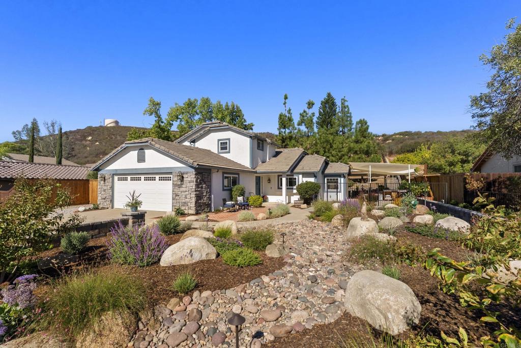 Welcome home to a beautifully maintained 3-bedroom, 2-bath home in the desirable community of San Diego Country Estates. This home shines with pride of ownership—every detail has been thoughtfully cared for and updated. The light-filled open floor plan features soaring ceilings and a spacious kitchen with an island on wheels, ideal for entertaining or everyday living. Energy-efficient upgrades include newer windows, appliances, furnace, and water heater. The primary suite offers a peaceful retreat with a large bathroom, walk-in closet, and a versatile bonus area—perfect as a home office, sitting room, or nursery. Two additional bedrooms and a full bath are conveniently located on the main level. Enjoy the outdoors year-round in the beautifully designed backyard with a covered patio—perfect for dining, relaxing, or hosting friends. Solar system in place for buyer to assume. This meticulously cared-for home is move-in ready and a true gem within SDCE.
