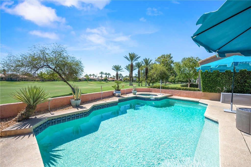 This meticulously maintained Mission Hills gem awaits your arrival. Located in the highly sought after gated community of Mission Hills in Rancho Mirage, you will find a wonderful home featuring expansive outdoor living space, a large pool and spa, barbeque area, pool deck, and a covered outdoor living room perfect for entertaining guests. Perched above the 4th fairway of the Westin Rancho Mirage Golf Resort & Spa, the views are simply spectacular. The main house consists of 3 large bedrooms and 3 baths, including two spacious primary bedrooms, each with their own private on suite full bathrooms. The beautiful kitchen is equipped with stainless steel appliances overlooking the pool area and golf course and receives the perfect amount of natural light creating a refreshing space to prepare meals for family and friends. There is a separate dining room, large living room, laundry room, one primary suite, and guest bedroom and bath all on the main level, while the second primary suite is located upstairs. And lets not forget the attached Casita with its own private entrance featuring 1 bedroom, a large living space, and 1 full bath, perfect for accommodating overnight visitors. Park two cars in the garage and keep your golf cart safe and secure in its own garage. This offering represents an outstanding opportunity to own a truly fantastic property in the peaceful setting of Mission Hills.