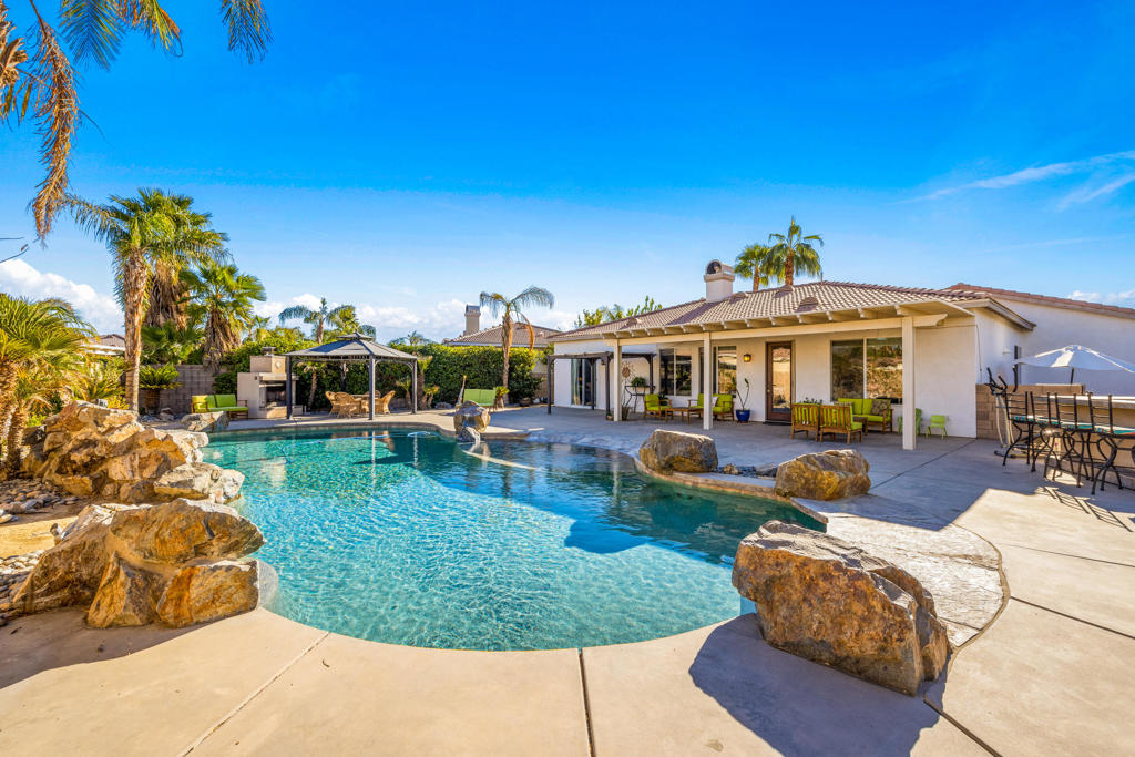 Seasonal is 6500.00 Sept- Dec $4500.00 This beautiful 3 bedrooms Plus den pull out couch. 3 bath home is located heart of La Quinta. The house is turnkey with everything you need to vacation. Open floorpan w/tile through out. In the backyard it has an outdoor Fireplace w/gazebo. Gorgeous, large custom salt water pebble tec pool with waterfalls is the centerpiece, flanked by a generous sized BBQ island, gazebo and gas fireplace! All surrounded by the backdrop of stunning mountain views! Gated community close to shopping, golf and award winning Dining! Just pack your bags and book your stay.