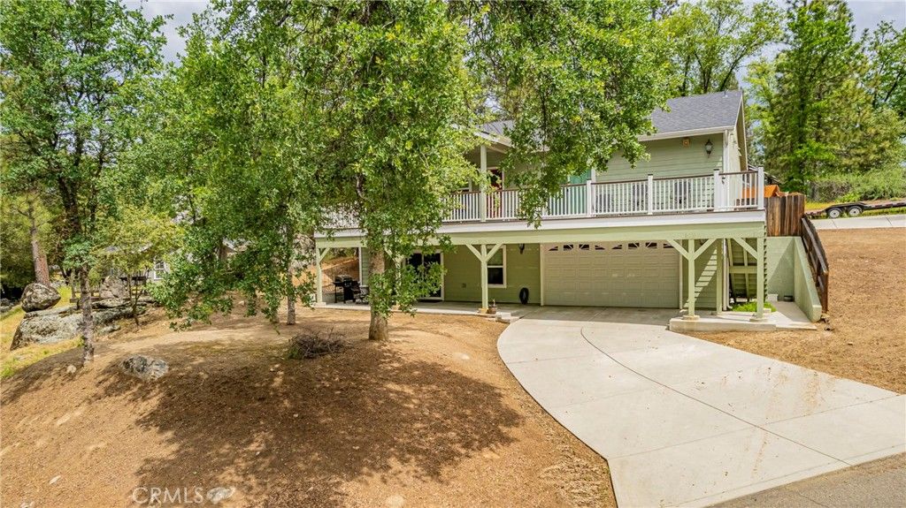 Photo of 48441 Woodbend Court, Oakhurst, CA 93644 (MLS # FR26083783)