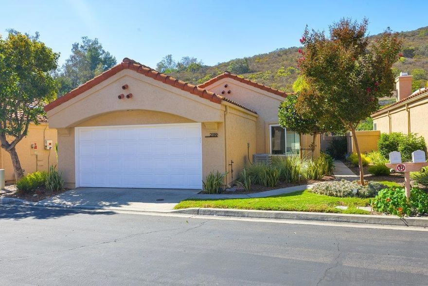 Welcome to this beautifully updated single-story home located in the highly sought-after Woodridge neighborhood. Lovingly maintained and meticulously renovated, this home features an updated kitchen with new quartz counter tops, stainless appliances and refreshed cabinets, remodeled primary bathroom, new flooring, interior paint, tile fireplace surround, and windows. Energy efficiency shines with solar panels installed in 2023, while the backyard features low-maintenance landscaping for year-round enjoyment.  Additional upgrades include fresh exterior paint and partial roof replacement in 2024. Inside, you’ll love the open-concept layout, where the kitchen flows effortlessly into the dining area and bright living room—anchored by a beautifully updated fireplace. Step outside to a covered patio overlooking a peaceful yard framed by mature trees, offering both shade and privacy. This home is the perfect blend of comfort, style, and functionality—all in a desirable location close to everything Woodridge has to offer: community pool, trails, good schools, and more. San Marcos school district.