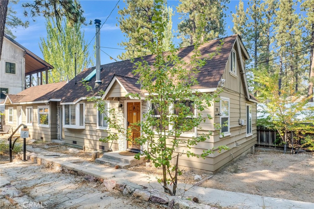 A fantastic TWO UNIT opportunity, each with two bedrooms, their own entrance, and amenities, are ideal for hosting multiple groups or generating consistent rental income. Located in a prime spot, just minutes from Big Bear Lake’s attractions, hiking trails, and ski resorts, this property is a top pick for vacationers year-round. Each unit features comfortable living spaces, modern kitchens, and updated bathrooms—ready to impress guests. The property has recently undergone extensive updates, including a brand new $30,000 roof, with three layers stripped down, all new wood, and metal flashing installed. The exterior has been upgraded with Hardy board around the perimeter to address termites and warped wood, with fresh paint to match. Additionally, the newly updated spa, serviced by Olson Spa, is fully operational and ready for guests to enjoy. Both units boast new wood-burning fireplaces with metal chimneys, adding a cozy touch to the mountain retreat. Convenience and security have also been enhanced with electric locks that integrate with an app and camera system, making check-ins seamless. Other upgrades include a washer and dryer in the breezeway, new walls and insulation where a previous leak was repaired, and fully painted, freshly renovated interiors for both units. Surrounded by towering pines, the property offers a serene setting for visitors to relax, complete with space for outdoor dining and lounging. Ample parking accommodates multiple vehicles, essential for larger rental groups.
Capitalize on Big Bear Lake’s booming rental market with this versatile property—perfect for generating passive income while enjoying everything this mountain paradise has to offer.