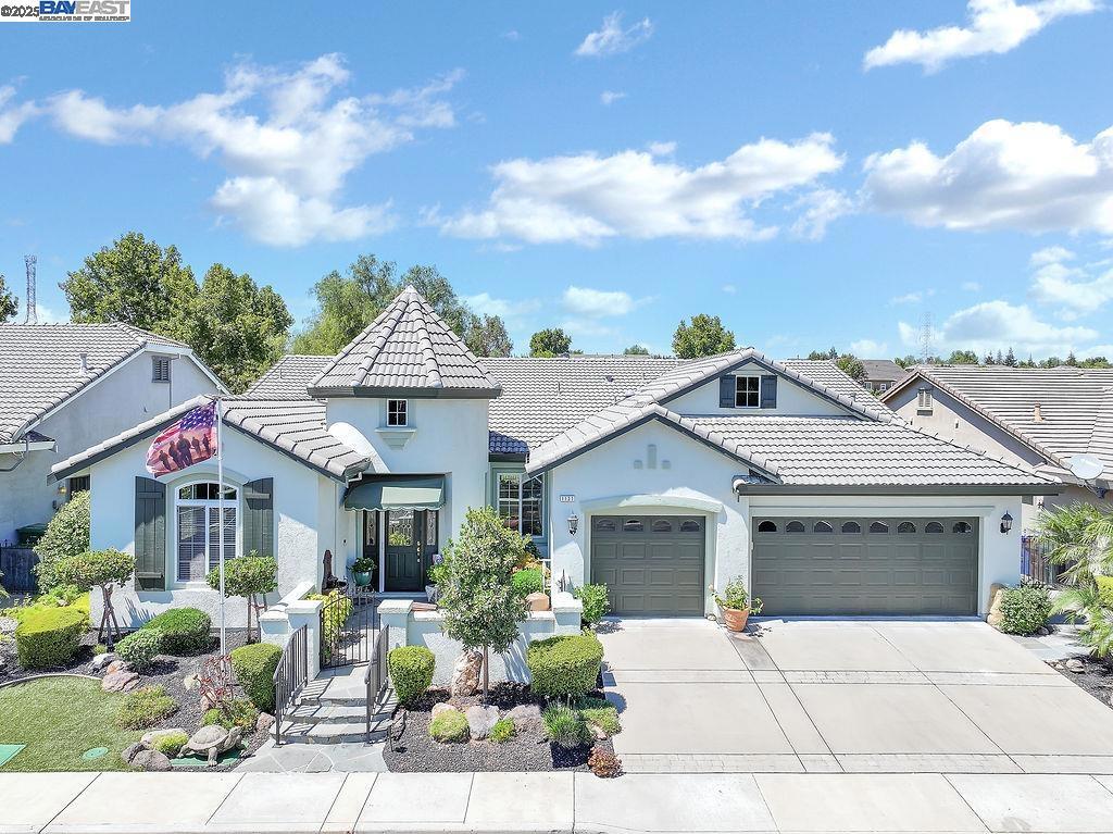 OPEN HOUSE SAT 1-4 & SUN 1-3 Enter at Baldwin Gate Welcome to 1131 Burghley Lane—The Majestic model, the largest in Summerset 4, set on a premium golf course lot with privacy, views, and a rare 3-car garage. This 2-bedroom, 2-bath home offers formal living and dining rooms, office/den plus a spacious family room with custom fireplace and stunning backyard views. The gourmet kitchen features a large island, breakfast bar seating, custom cabinetry, copper sink, granite counters, and generous storage. Crown molding, hardwood flooring, and a functional, flowing layout enhance the home’s appeal. The beautifully upgraded backyard includes an extended covered patio with drop-down shades, outdoor speakers, turf, pavers, and wrought iron fencing with gated sections. The front courtyard includes turf, flagstone, and a water feature. Additional upgrades: Carrier Infinity HVAC, new water heater (2024), Wi-Fi garage opener, attic storage and built-ins. Enjoy gated resort-style 55+ living with clubhouse, pool, spa, tennis & more!