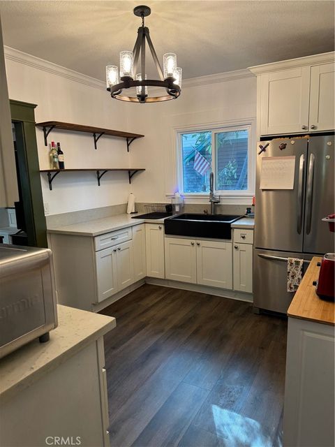 Photo of 1355 N Gordon Street, Pomona, CA 91768 (MLS # IV25264022)