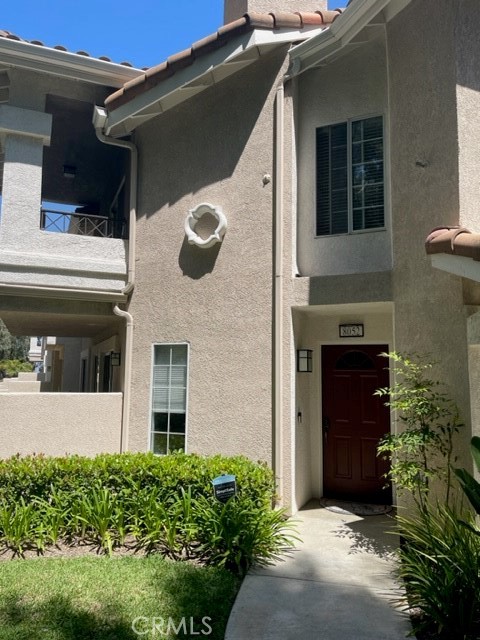 Upgraded single story condo in the sought after Viewpointe gated community. This ground floor unit features remodeled kitchen with stainless steel appliances, granite countertops and newer cabinets. The bathrooms have showers with glass enclosure and upgraded vanities and fixtures. Other great features include inside laundry, huge outdoor patio area and perfect location close to the pool (but not too near). The unit is also adjacent to guest parking and is facing a quiet serene woodsy area.
