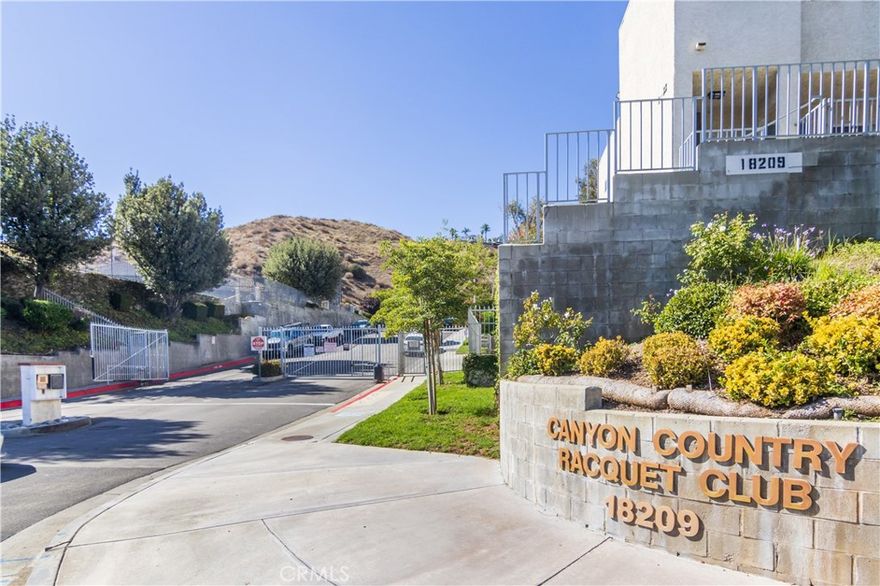 Welcome to the desirable gated Canyon Country Racquet Club Community.  This beautiful condo located on the lower level, offers two bedroom and two remodeled bathrooms.  Laminated floors throughtout, Good size kitchen with plenty of cabinets, nice counters, it has a breakfart bar and it also includes the refrigerator.

Painted recently, Master bedroom offers a walk-in closet in between the bedroom and the full bathroom.  The living room offers a cozy gas fireplace, perfect to entertain, also the sliding door goes into your patio. Additional features are the washer and the dryer located inside the unit.

This beautiful complex offers plenty of amenities, including a recently updated sports court, sparkling pool and spa.  Centraly located in Canyon Country, home has easy access to the freeways, close to shopping and restaurants.