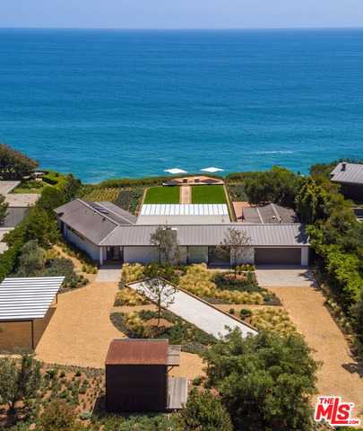 On Malibu's prestigious Point Dume bluff top, this mid-century Ranch-style home w/contemporary interiors is located on a quiet cul-de-sac road w/beach access. Unstoppable 180º ocean views from every rm & wood flrs throughout features a huge great rm w/flr to ceiling glass windows w/high ceilings & wd burning FP. The dining area & gourmet kitchen of Caesarstone countertops is tied into the open floor plan. A wraparound wd deck & boardwalk lead to a cliffside lounge deck surrounded by a grassy lawn & drought tolerant low water consumption landscaping. The home offers a sun-filled owner's suite w/corner glass sliders & a luxe bath as well as a 2nd bdrm & separate GR w/private entrance. The front yard has a bocce ball court & a free-standing air-conditioned private office. The exterior architectural polycarbonate awnings block 90% of suns UV rays & decreases the heat index for comfortable outdoor living year round. Full site security includes laser beam technology & full camera coverage.