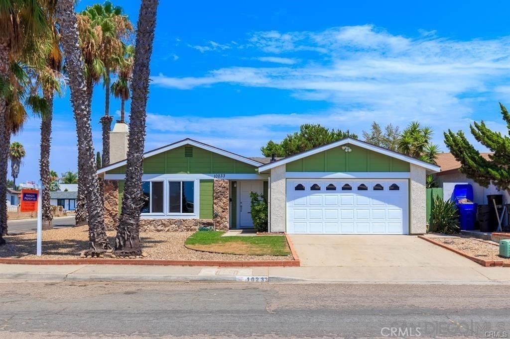 Welcome home to your beautifully remodeled 4 bedroom 2 bath sanctuary! New Paint through out as well as all new flooring in the bedrooms make this the perfect home! Enter into the expansive open and airy living room with direct views to the dining room and kitchen. The open layout is perfect for entertaining! The kitchen is ready for all of your home chef needs! Large back yard with RV/Boat access and parking! Dual pane windows and New AC make this a very energy efficient home! Close to schools, restaurants, shopping and everything the wonderful community has to offer!