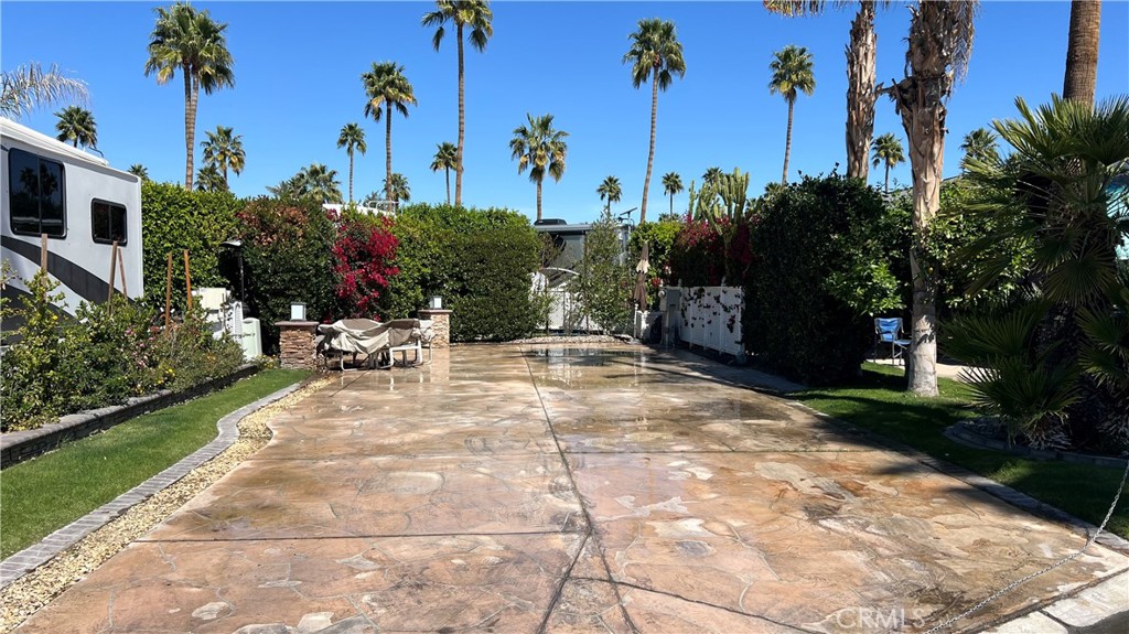 Lot #362. Welcome to a premier RV Resort and Country Club offering 27 holes of executive golf, 10 tennis courts, 13 pickle ball courts, 8 swimming pools, a dog park, fitness center, a beauty salon/barbershop, full service restaurant, convenience store, two club house and so much more! Featured on each lot is a metered 50-amp electric service, water, sewer, and cable services. A sprinkler system to water bushes and grass is also set up on this lot. Conveniently located a walking distance from the La Palma Clubhouse and Satellite C's pool, tennis court, and bathrooms. Come enjoy this lots beautiful Mountain View while enjoying all the amenities Outdoor Resort Palm Springs has to offer!