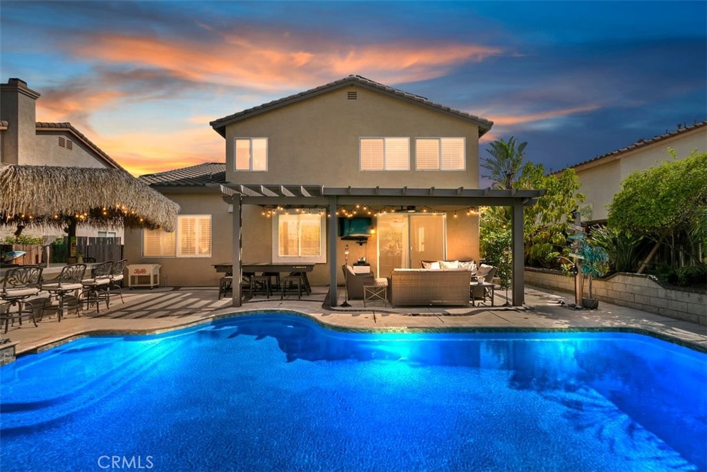 ACT FAST*** THIS BEAUTIFUL, WELL-CARED-FOR, ENTERTAINER'S DREAM, POOL HOME FEATURING 4 BEDROOMS/3 BATHROOMS (COULD BE 5th BEDROOM DOWNSTAIRS WITH FULL BATHROOM), 22 PAID SOLAR PANELS(HUGE SAVINGS ON ELECTRIC), OUTDOOR KITCHEN/ TIKI HUT BBQ/BAR, NEW AC UNIT, NEWER EXTERIOR PAINT ON A VERY NICE STREET IN THE HEART OF ORANGECREST. THIS HOME IS GORGEOUS, OPEN, HAS HIGH CEILINGS & IS COMPLETELY UPGRADED WITH CUSTOM PAINT, BASEBOARDS, CROWN MOLDING, BUILT-IN IN FAMILY ROOM, LARGE LAUNDRY ROOM & 2 TANKLESS WATER HEATERS FOR INSTANT HEAT, NO HOA, LOW TAXES, & GREAT SCHOOLS. KITCHEN FEATURES 2 ISLANDS WITH QUARTZ COUNTERTOPS, STAINLESS STEEL APPLIANCES, SHIPLAP WALK-IN PANTRY/DINING ROOM WALL & MODERN LIGHTING FIXTURES. THIS HOME HAS LUXURY COMMERCIAL-GRADE VINYL PLANK FLOORING, PLANTATION SHUTTERS THROUGHOUT, WITH 2 CUSTOM ROMAN SHADES IN KITCHEN & PRIMARY BATHROOM. PRIMARY BATHROOM HAS FRAMELESS SHOWER, FREESTANDING SOAKING TUB, GORGEOUS VANITY WITH MATCHING BACKSPLASH & HIS/HERS 2 WALK-IN CLOSETS. BACKYARD FEATURES A SALTWATER CHORINATION POOL RECENTLY REPLASTERED WITH QUARTZ, NEW TILE, COPING & NEWER POOL/SPA HEATER ALONG WITH TROPICAL LANDSCAPING. ALUMIWOOD PATIO COVER WITH FAN & RECENTLY ADDED TIKI HUT OUTDOOR KITCHEN, PERFECT FOR SUMMER & FAMILY GATHERINGS. THIS HOME IS MOVE-IN READY WITH POTENTIAL FOR RV PARKING & A MUST SEE!!!