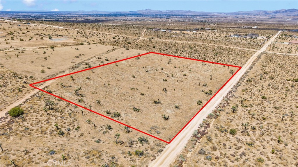Discover the perfect canvas to build your dream home with this 2.45-acre parcel in the beautiful and peaceful area of South Apple Valley. Offering breathtaking panoramic desert and mountain views, this lot provides the space and freedom to create a custom retreat that reflects your lifestyle.
With over 106,000 square feet of land, there’s ample room for your vision—whether it’s a spacious home, room for horses, or outdoor recreation spaces. The serene, rural surroundings make this property ideal for those seeking both privacy and a connection to nature, while still being within a short drive to shopping, dining, and schools.
Multiple adjacent lots are also available, making it possible to expand and secure even more space for your future plans. Zoned RL (Rural Living), the property offers flexibility and opportunity for a variety of uses.
Don’t miss this chance to own a prime piece of land in a highly desirable location of Apple Valley, perfect for building your personal oasis or holding as an investment.