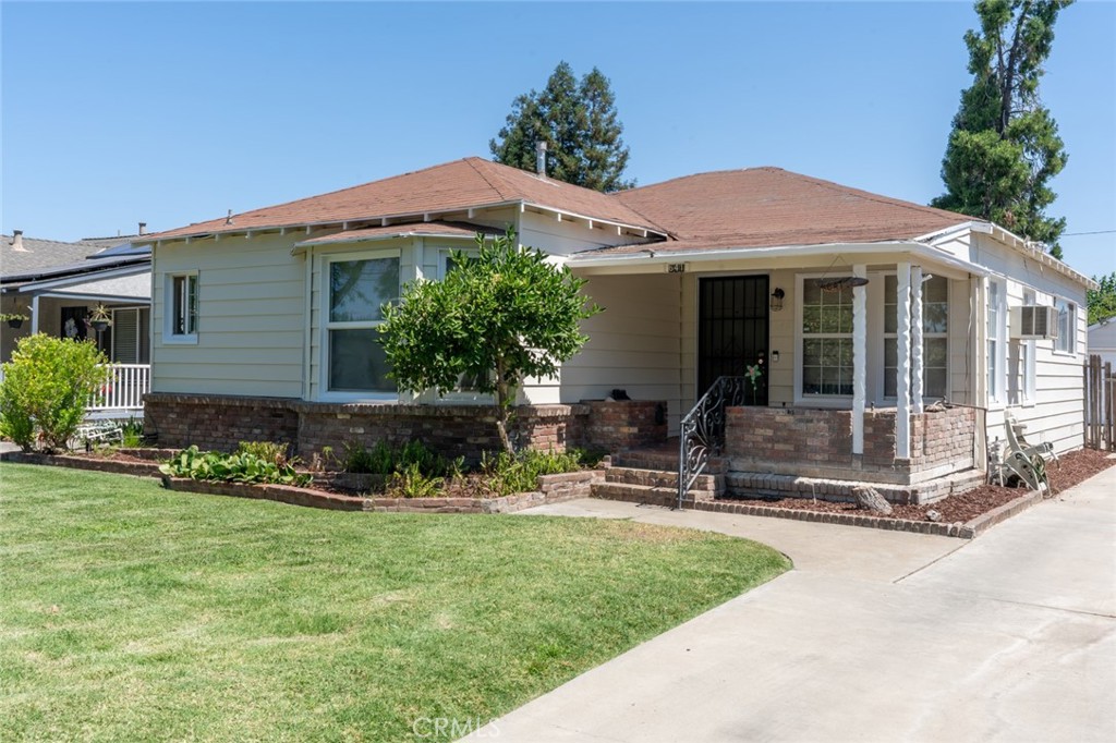 Beautiful gem located in Central Merced
Situated in a quiet central Merced neighborhood, this well-cared-for home offers a comfortable layout, timeless details, and plenty of natural light. The exterior features low-maintenance vinyl siding and some dual-pane windows for improved energy efficiency.
Inside, refinished Douglas fir floors run throughout the home, adding warmth and character. The spacious living room connects to a formal dining area with a bay window, and the large kitchen includes ample cabinet space and a corner sink overlooking the front yard. You'll also find an indoor laundry area and a pantry for everyday convenience.
One of the standout features is the large bonus room at the back of the home, which overlooks the beautifully landscaped backyard. This versatile space is ideal for entertaining, a home gym, studio, or any use that suits your needs.
The oversized lot includes a backyard filled with mature plants and flowers, creating a peaceful outdoor setting. A detached garage and long driveway provide plenty of off-street parking.
This is a solid, centrally located home with original charm and flexible living space ready to fit your lifestyle.
