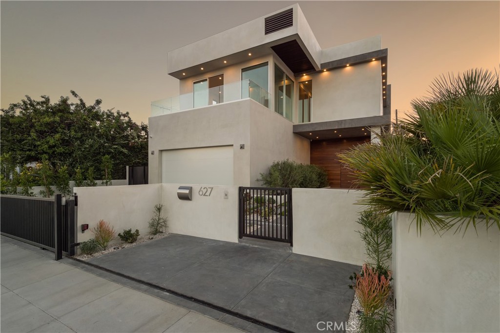 Welcome to Your Modern Melrose Masterpiece
Discover this striking single-family home in the vibrant heart of Melrose, Los Angeles. Built in 2016, this contemporary residence offers 4,241 sq ft of refined living space plus over 2,000 sq ft of rooftop and balcony areas—perfect for entertaining, relaxing, and soaking in the city views.
Step inside to find four spacious bedrooms and five luxurious bathrooms, all meticulously designed with comfort and style in mind. The expansive open layout is accented by pristine flooring, sleek finishes, and walls of oversized windows that flood the home with natural light.
A gated entrance, private driveway, and attached garage provide both security and convenience. Outdoors, you’ll enjoy a sparkling backyard pool and a rooftop retreat complete with a jacuzzi, fire pit, bar, and breathtaking views of the Hollywood Sign and surrounding hills.
Key Features & Amenities:
• Gated grounds with secure parking
• Yard maintenance included in rent (utilities—cable, gas, internet—paid by tenant)
• Designer lighting and modern fixtures throughout
• Rooftop entertaining area with bar, jacuzzi & fire pit
• Walking distance to Melrose Avenue, The Grove, and Pan Pacific Park
• Close to top-rated schools
• Pet-friendly (inquire for details)
Whether you’re hosting friends, enjoying a sunset rooftop soak, or exploring the neighborhood’s world-class dining and shopping, this home offers the ultimate Los Angeles lifestyle.