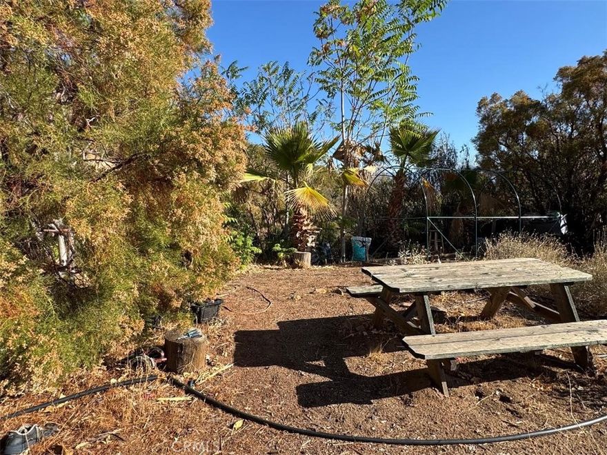 High (Way up on top) on a Hill in Anza this 10.53 acres has the ultimate of views. Backed by a mountain on Southern side and sweeping around this
parcel is PRIVATE beyond private.    There is a 150 GPM well and power to well.  Gated entrance. Pads, storage tanks, palm trees. 
Quiet starry evenings , NO smog or traffic, nothing but the sounds of the local animals. 
Do you want privacy? or get away from the city? Or just smell the clean air then you have found the place.
 
Views are amazing, because you are on the top of world.  Soft breezes makes this getaway
a perfect weekend retreat.  Temperatures in our area leaves for many opportunities for all kinds of fruit trees, nut trees and gardens.
Grapes love our climate and elevation.  Living in the country is a unique blessing.