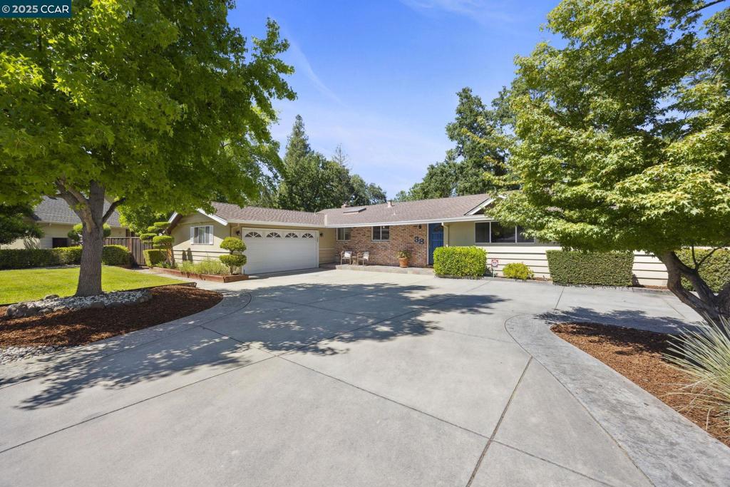 Exciting price in an exceptional Walnut Heights location! Captivating single- level home on a peaceful court. Flexible floor plan with two spacious living areas—one with a classic brick fireplace, the other perfect for relaxing or entertaining—all with views of the expansive backyard. Enjoy hardwood floors throughout, fresh interior paint, stylish new lighting, and a refreshed kitchen featuring a gas cooktop, new dishwasher and rich solid wood cabinetry. Four generously sized bedrooms include an updated primary with ensuite. Step outside to an oversized, mostly flat lot with endless possibilities. Dine al fresco on the large paver patio, play in the open grassy areas, or enjoy a picnic in your very own redwood grove. There is room for a pool, sports court, ADU—or all three! Shed with electricity offers great potential as a home office, studio, or storage. Five minutes to downtown. Zoned for highly rated schools, including beloved Walnut Heights Elementary, this home blends location, flexibility, and charm—it truly speaks to the heart!