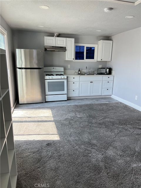 Photo of 7068 Calvin Avenue, Reseda, CA 91335 (MLS # SR26073454)