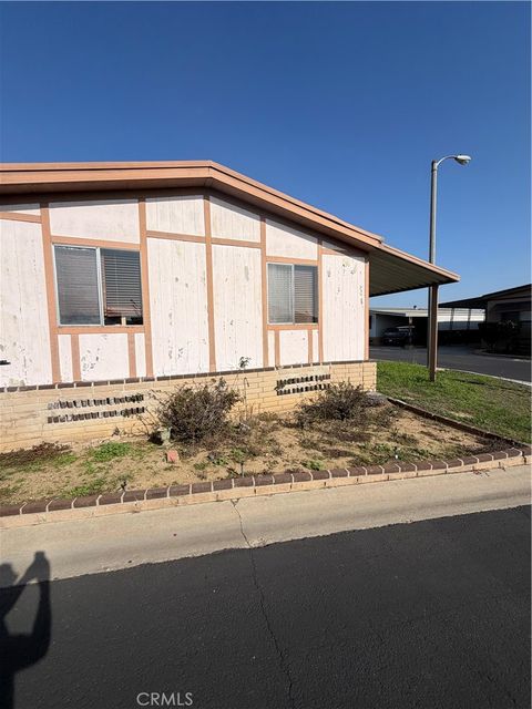Photo of 19009 S Laurel Park Rd #323, Compton, CA 90220 (MLS # PW25275441)