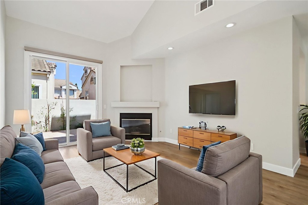Come see why residents love this community so much, while experiencing this immaculately owned and updated 2 bedroom, 2.5 bath townhouse style condo. Walk in, right into the open floor plan entrance with the dining and kitchen area expanding into the double height living room. Bask in all the natural light through the skylight and various windows of the home, or step through the sliding glass door to the private patio, to enjoy some morning coffee in the sun. Seller has renovated various parts of the home, including an updated half-bath on the 1st floor, trendy full bathroom and shower for a bedroom suite on the 2nd floor, as well as brand new modern kitchen appliances, new skylight, new vinyl windows, and new modern flooring throughout. Peaceful and welcoming, the intimate community amenities feature 2 separate pools and hot tubs. Exciting new updates to the community are also already in the works, with HOA expected to finalize upgrades in the Fall, delivering a freshly repainted exterior to the units and revitalized greenery with new landscaping.
Enjoy a new healthy lifestyle, from all the convenience of the home's walking friendly location. Take only a few steps to get to an elementary school, a Montessori, local eateries, and everyday essentials like groceries, a pharmacy, and a bank. Or escape from the stresses in life by walking a few steps in another direction to get immediate access to trails and multiple parks. UCI is minutes away with a short drive, the brand new UCI Health Medical Center (anticipating a hospital and emergency room opening later this year) is just 7 minutes away, and John Wayne Airport is a quick 10-minute drive.
Home was loved and cared for by the Seller, providing an abundant life, including effortless rental income thanks to the strong tenant demand. Now, its your turn to be homeowners of this lucky move-in ready home.