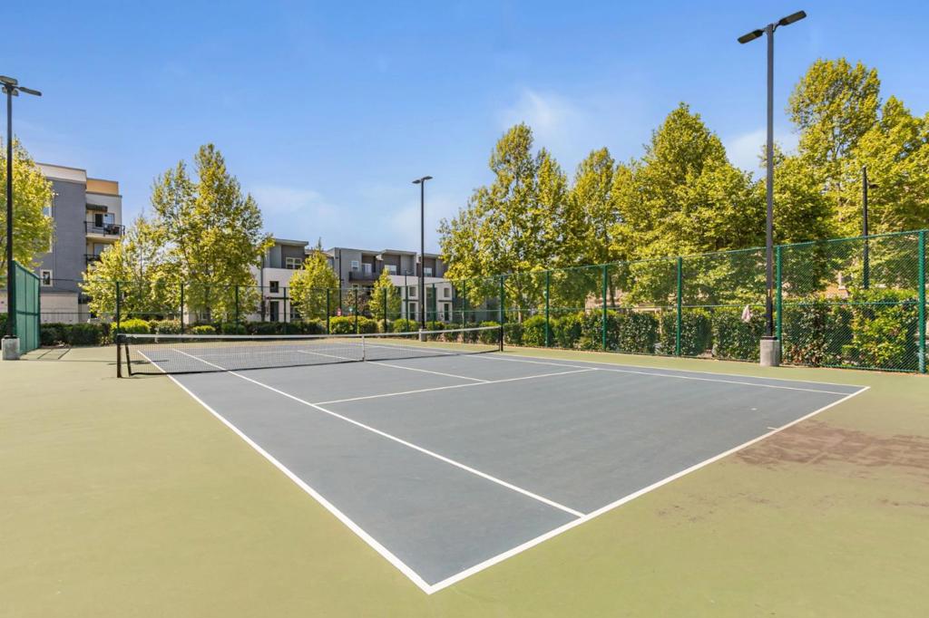 MODERN AND SLEEK! STAGING AS 2 BEDROOMS AND 2 FULL BATHROOMS. WALKING DISTANCE TO BART MILPITAS. PERFECT FOR COMMUNTERS OR INVESTORS. DOUBLE CEILING LUXURY PENTHOUSE WITH NO NEIGHBOR ABOVE. BUILT BY PULTE IN 2018. THE COMPLEX HAS A SECURITY DOOR FOR PRIVACY. FEATURING 1 LARGE BEDROOM, 1 LARGE DEN (IDEAL FOR A MEDIA ROOM, OFFICE, OR KIDS BEDROOM), 2 SPACIOUS FULL BATHS, 1 CAR GARAGE WITH PLENTY OF STORAGE ! OPEN LIVING SPACE. GOURMET KITCHEN W/ CUSTOM CABINETS, QUARTZ COUNTERTOPS, GOOD-SIZED ISLAND, NEWER SS APPLIANCES. NICE FLOOR PLAN WITH PLENTY OF NATURAL LIGHT, WINDOW COVERINGS, MASTER WALK-IN CLOSET, EXTRA CUSTOM CLOSET, RECESSED LIGHTING, CEILING FAN IN THE BEDROOM, TANKLESS WATER HEATER, WASHER & DRYER IN-UNIT, ELEGANT MODERN UPDATES THROUGHOUT. IT ALSO INCLUDES A PRIVATE BALCONY TO ENJOY THE SUN AND FRESH AIR. HOA COVERS GARBAGE PICKUP, LANDSCAPING, ROOF MAINTENANCE, ELEVATOR MAINTENANCE, BUILDING EXTERIOR MAINTENANCE, AND LOBBY CLEANING. CONVENIENTLY LOCATED OPPOSITE TO THE TENNIS COURTS & PLAYGROUND ,SHORT WALK TO GREAT MALL, PARK, BART, VTA & BUS STOPS. ONLY 5 MINUTES' DRIVE TO GROCERY STORES AND RESTAURANTS. EASY ACCESS TO ALL MAJOR FREEWAYS & HIGH-TECH FIRMS. NO RENTAL RESTRICTIONS. THIS WON'T LAST LONG!