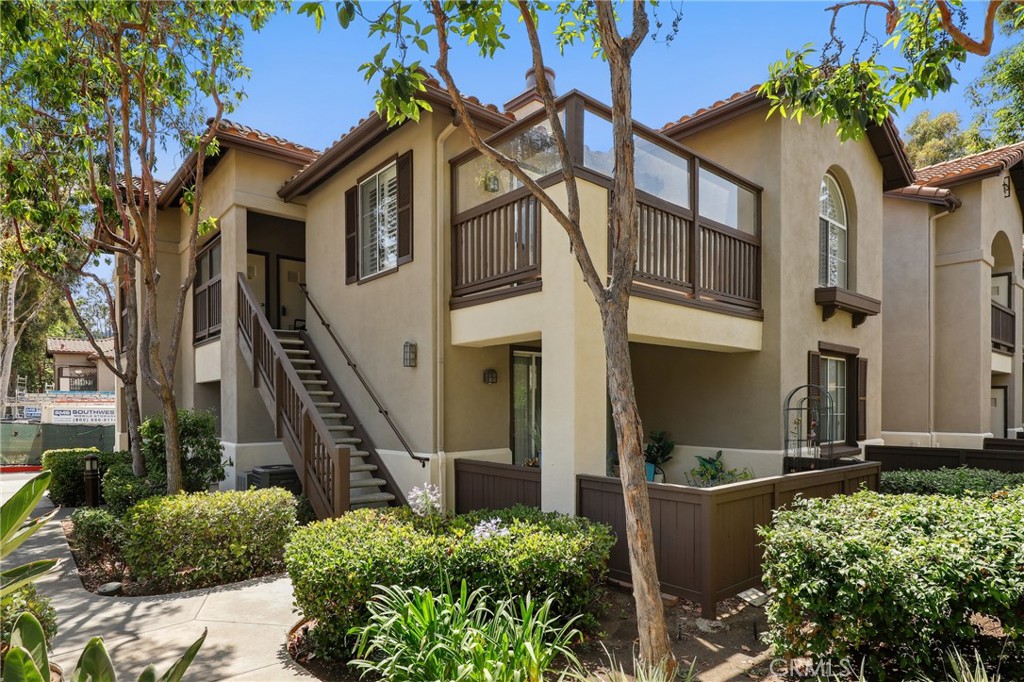 Turnkey upper-level condo featuring dual primary suites in Rancho Vera Cruz. Step into a spacious, open-concept living area with recessed lighting, a cozy gas fireplace, and a sliding glass door that fills the space with natural light and opens to your private patio.
The fully remodeled kitchen showcases sleek quartz countertops, stainless steel appliances, crisp white custom cabinetry, and a convenient eat-in bar that flows seamlessly into the dining area—perfect for entertaining.
Both primary suites are generously sized, each with updated en-suite bathrooms. Modern upgrades throughout include new flooring, cabinetry, bathrooms, and kitchen finishes.
Enjoy the convenience of in-unit laundry and a two-car attached garage with a brand-new door and opener. Located in the desirable Rancho Veracruz community, residents enjoy access to a sparkling pool, spa, gym and more.
Move-in ready and beautifully upgraded—don’t miss this one!