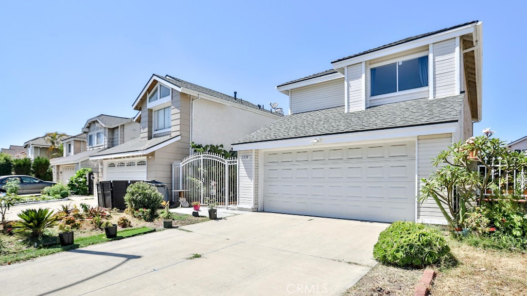 Welcome to this beautiful single-family detached home built in 1987 and features 3 beds and 3 baths (one downstairs and 2 upstairs). As you step into the home, you are greeted by an open floor plan with a high ceiling living room burst with ample natural lights and a cozy fireplace. The newly remodeled kitchen is open to a family room/dining room and offers an elegant breakfast counter. Stainless appliances and quartz countertop are standard. The upstairs master suite features high ceiling, spacious walk-in closet, and a newly renovated master bath with floating dual vanity sink. Other features include luxury vinyl floor thru-out and 3 newly renovated baths with walk-in shower. Additionally, there is a fully permitted 157 Sq. Ft. enclosed patio next to the living. The garage is converted into a playroom but is still 100% fully functional for vehicles parking. Low maintenance yards and no HOA. Conveniently located just minutes to the well known "The Source OC" shopping mall, freeway 5 and 91, Knott's Berry Farm, Downtown Buena Park, public transportation, schools, churches and more! Hurry it won't last long!