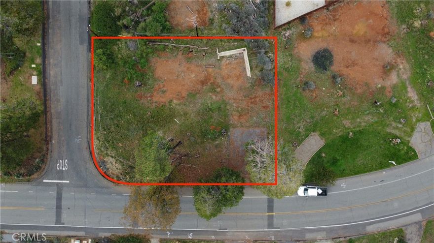 Wonderful quarter acre lot located in Magalia! This corner lot has mature trees that still line one side of the property providing a kick start to the landscaping while reminding us of the resilience of the pines. The previous home was 2 bedrooms, 2 bathrooms, 1,248 sqft. Come be part of the rebuilding in the area and find your peace in the mountains of beautiful Magalia.