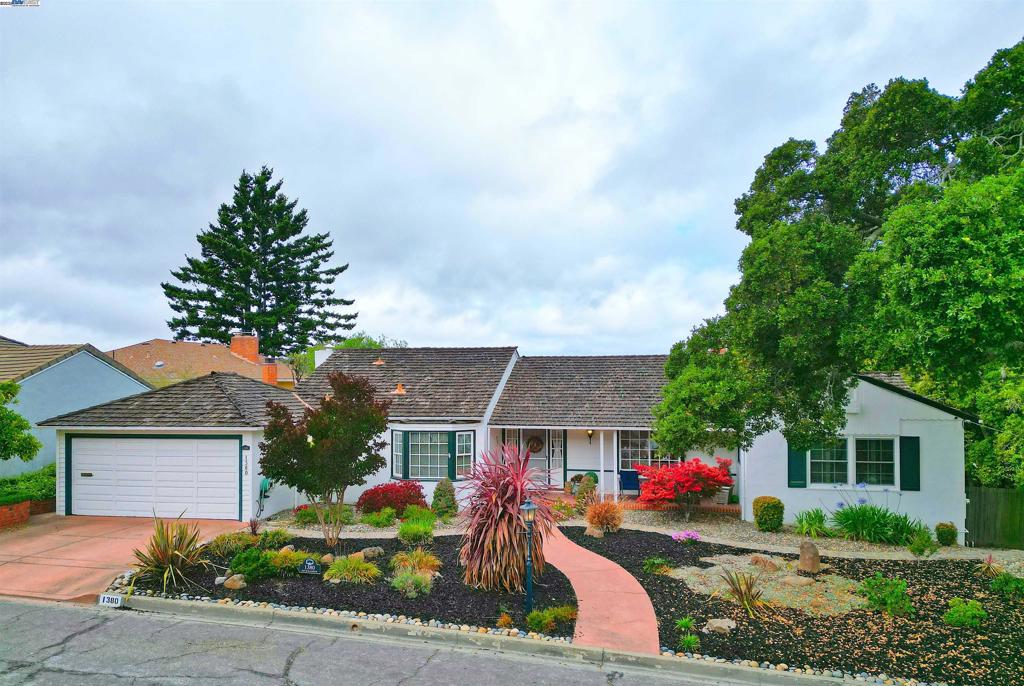 Enjoy the views and solitude from this wonderful Bay-O-Vista home. You'll find 3-bedrooms and 2 baths located on the main level of this generous 2,287 sq.ft. home with 1 additional bedroom and full bathroom downstairs. You can choose to enjoy canyon and city views from either the living room with it's gas burning fireplace or the family room with it's floor to ceiling windows. Or exit the slider to rear yard with it's enclosed brick patio, deck with pergola, fountain, mature landscaping and fruit trees. Additional features of this home include dual pane windows, hardwood floors, inside laundry room plus an abundance of storage and close proximity to shopping and Hwy 580.