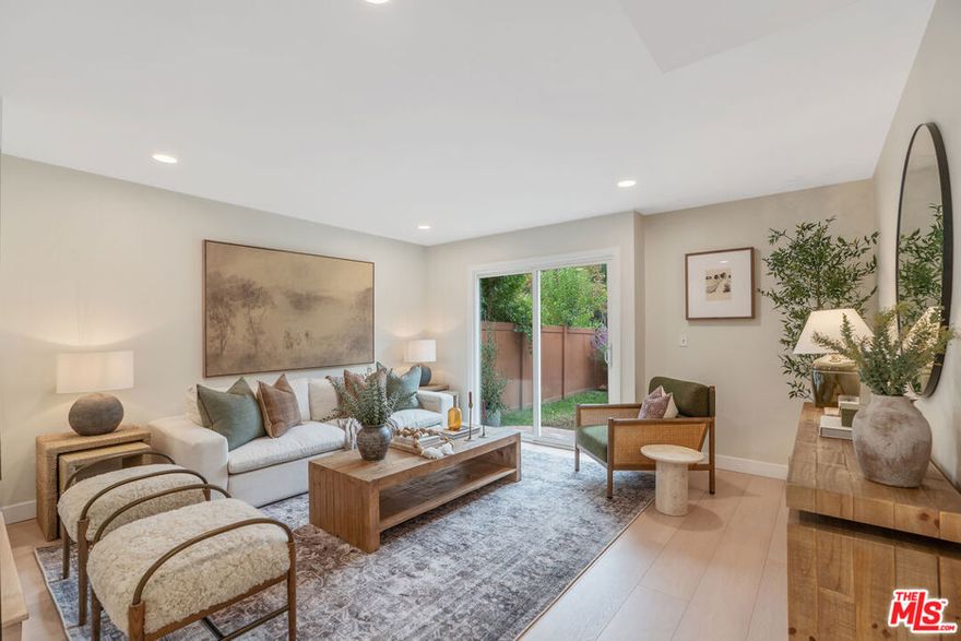 Beautifully Upgraded End Unit Townhome with One of the Largest Private Yards in the Community! Located in the heart of Agoura Hills, this recently upgraded end-unit townhome offers exceptional indoor-outdoor living with one of the largest private yards and patio in the community. The inviting floor plan features spacious living and dining rooms with walls of glass that fill the home with natural light and open to a large patio and lush backyard perfect for relaxing or entertaining. Upstairs, you'll find two comfortable bedrooms and a versatile bonus den or home office, ideal for today's lifestyle. The newly renovated bathroom showcases designer Bedrosians tiles and stylish finishes. Additional highlights include updated flooring, fresh paint, and direct access to the yard from the main living areas. The home is walking distance to the Community pool and spa! Enjoy the best of community living with the feel of a private home, just moments from parks, top-rated schools, and all that Agoura Hills has to offer. Located 1/2 mile from Liberty Canyon Trailhead for hiking & mountain biking. Easy access to 101 freeway, close to Pepperdine University, Malibu, restaurants & shopping. All this and in Las Virgenes School District.