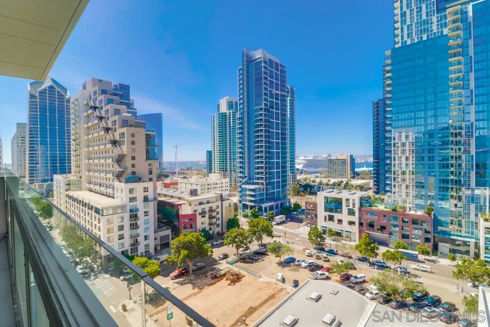 Claim an entire top penthouse floor in the heart of Downtown’s Columbia/Little Italy creative hub! The 9th-floor suite (legally 3 condos combined) at Metrowork Condo (approx. 6678 sf is a designer-furnished, fully built-out open-concept office delivered TURN-KEY. Secure direct-access elevator opens to polished concrete floors, soaring 12' ceilings, exposed steel & ductwork, and panoramic windows wrapping three sides for all-day natural light and dramatic city & bay vistas. Current configuration: spacious collaborative bullpen with ergonomic workstations, glass-walled conference room, two privacy phone pods, hospitality bar with sink, dishwasher & beverage fridge, lounge area for client pitches, dedicated server/storage room, and in-suite restroom. Plug-and-play infrastructure—CAT-6, fiber service, ceiling-mounted speakers, smart HVAC, security cams—lets you move in and start creating day one. 7 deeded, gated parking spaces plus bike storage convey; abundant guest parking garages nearby. HOA fee covers water, trash, janitorial of common areas, and a stylish lobby with digital directory. Prime walk-score location steps to Waterfront Park, Amtrak/Trolley, Little Italy’s famed dining, and quick access to I-5 & airport—ideal for creative firms, family offices, tech start-ups, or boutique financial, design and legal practices seeking an exclusive full-floor identity. Furniture, fixtures & equipment negotiable. Square footage per tax records; buyer to verify all. Metrowork is a well-capitalized HOA with solid reserves and recent building systems upgrades.