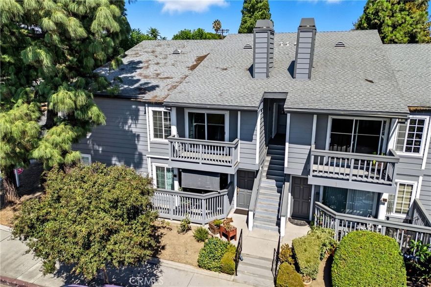 Welcome to this spacious and well-maintained three-bedroom, two-bathroom condo located in a secure gated community in the heart of North Hills. The home features an open and bright living room with high ceilings, a cozy fireplace, and direct access to a private deck, creating the perfect setting for relaxing or entertaining. The functional layout offers plenty of natural light throughout, enhancing the warm and inviting atmosphere.

The kitchen comes fully equipped with a microwave, refrigerator, and ample cabinetry for storage. Tile flooring flows seamlessly throughout the home, providing easy maintenance and durability. A stacked washer and dryer are conveniently included inside the unit. The property also features central air conditioning and heating, attic access for additional storage, and a thoughtfully designed floor plan that maximizes comfort and functionality.

Two assigned covered carport parking spaces are located within a gated parking area for added security and convenience. Residents of this community enjoy access to a sparkling swimming pool, relaxing jacuzzi, and well-maintained landscaped common areas managed by the homeowners association.

This property offers an excellent location with easy access to major freeways, shopping centers, restaurants, schools, and public transportation. Whether you are a first-time homebuyer, looking to downsize, or searching for an investment property, this condo provides the perfect combination of comfort, practicality, and accessibility in one desirable package.