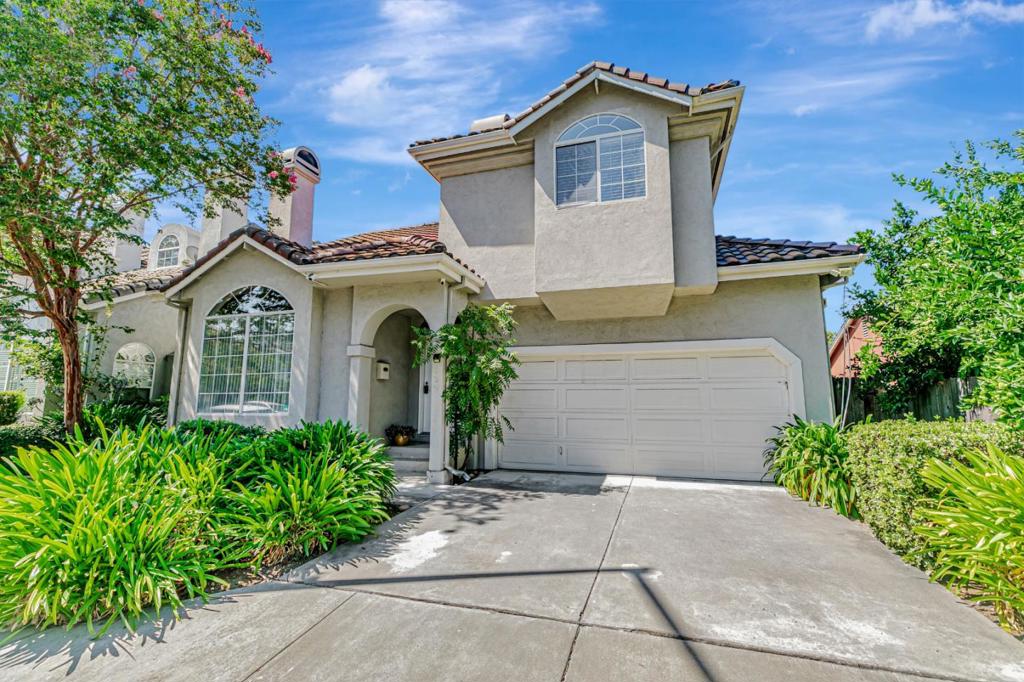 A HIDDEN SINGLE FAMILY RESIDENCE NEAR DOWNTOWN CAMPBELL Soaring vaulted ceilings with natural sunlight streaming through elegant windows set the stage for a sense of warmth and charm in this remarkable single-family home. Featuring three full bedrooms and three full bathrooms. A thoughtfully placed bedroom and full bathroom on the main floor make it perfect for guests, multi-generational living or a private office/hobby room. The spacious Primary suite is a true retreat with a spa jacuzzi tub, two vanity areas and beautiful fireplace. Enjoy the prime location-just a short stroll to downtown Campbell's boutique shops and fine dining and lively community events. Meander the farmers markets, enjoy summer concerts in the park or venture out into nature and explore the nearby trails. This home is the perfect blend of quiet relaxation at home with the freedom to connect to the vibrant rhythm of downtown Campbell.