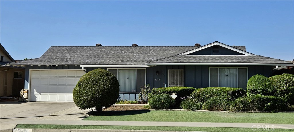 Comfortable retirement living awaits in this almost 1200 square feet single story 2 bedrooms/2 bath home in Panorama Village. Refreshed with new interior paint, the home is turnkey and move-in ready. Enjoy the resort-style amenities the community offers such as pool, sauna, 9-hole golf course, clubhouse, recreation and exercise rooms, plus more. Relax and entertain in the spacious living and dining rooms, prepare meals in the bright kitchen with new range and microwave, new stainless steel sink and faucet, plus enough storage space in solid wood cabinets; sliding glass door opens to the covered patio for outdoor leisure; good sized primary suite with large closet and roomy primary bath with new toilet; secondary bedroom with new ceiling fan and hall bath with stall shower; attached single-car extra-wide-long garage accessible through the dining area. The exterior paint and new roof installed only two years ago. Convenient location just minutes to shopping and city amenities.