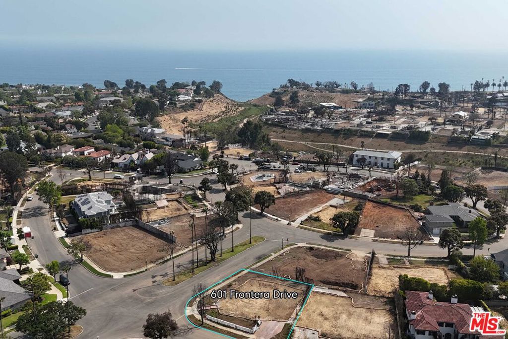 Ideally situated on the prime corner of Frontera Drive and Pampas Ricas Boulevard in the coveted Huntington Palisades, this large 9,240 square-foot lot offers an incredible opportunity to build your dream home. Just moments from the Palisades Village, Palisades Park, the beach, scenic trails, and more, this location embodies the best of coastal living. EPA (Phase 1) Remediation & debris removal by Army Corp of Engineers (Phase 2) are both complete. Property is not located within the Coastal Commission Authority. Be part of the Palisades' inspiring renewal - create your forever home in one of Pacific Palisades' most sought-after neighborhoods.