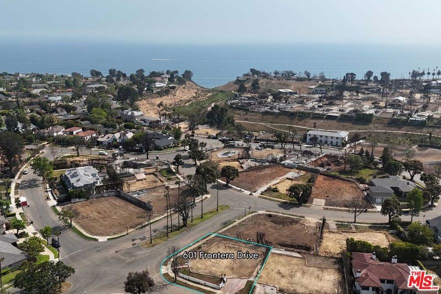 Ideally situated on the prime corner of Frontera Drive and Pampas Ricas Boulevard in the coveted Huntington Palisades, this large 9,240 square-foot lot offers an incredible opportunity to build your dream home. Just moments from the Palisades Village, Palisades Park, the beach, scenic trails, and more, this location embodies the best of coastal living. EPA (Phase 1) Remediation & debris removal by Army Corp of Engineers (Phase 2) are both complete. Property is not located within the Coastal Commission Authority. Be part of the Palisades' inspiring renewal - create your forever home in one of Pacific Palisades' most sought-after neighborhoods.