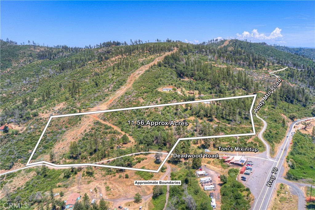 Create a new lifestyle here. Right off Hiway 70, 11.5 acres with 2 building sites. PGE is to the sites. Well and septic remain where house was destroyed by fire. Close to Toni's restaurant with covered outdoor seating (formerly Scooters), Yankee Hill Hardware/Post office, Cal Fire Butte Unit, Grocery and Fuel. Hilltop views of Lake Oroville and Concow Lake. Easy road access from Hiway 70 for short drive to Chico or Oroville. RV stays on upper site for storage or living. Or connect your own while you continue to develop your new home in nature. This location is ready for a new owner.