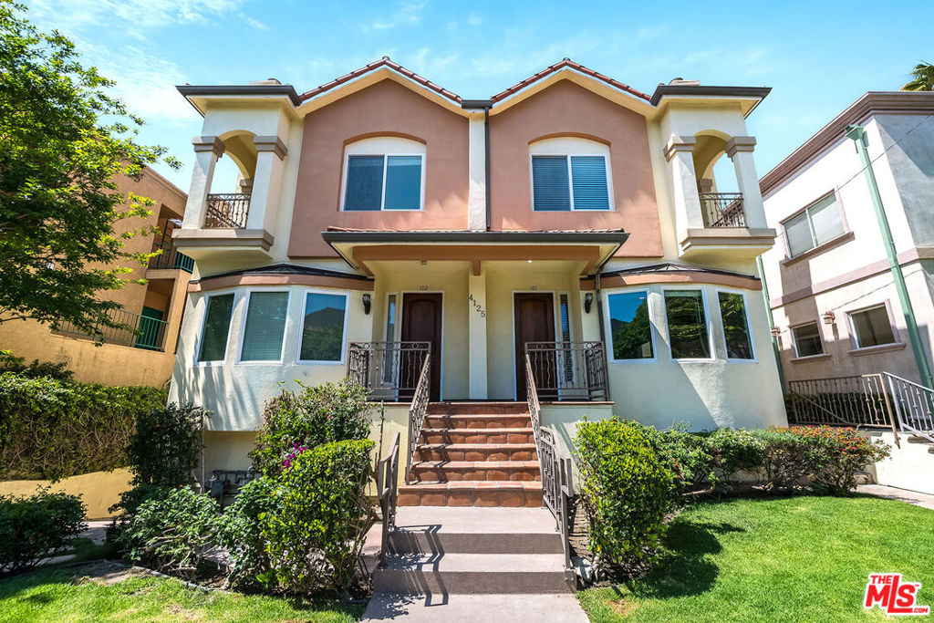 Exquisite Toluca Lake Townhome Upscale Living in a Private Cul-de-Sac. Nestled in a serene cul-de-sac just moments from the heart of Toluca Lake Village and Warner Bros. Studios, this stunning 1,540 sq ft luxury townhome blends sophisticated design with modern convenience. Offering a beautifully curated floor plan, this residence welcomes you with rich natural light, high ceilings on the main level, and timeless architectural details throughout. The grand living and dining area is ideal for entertaining, featuring hardwood floors, elegant crown molding, and a charming fireplace that anchors the space. The chef's kitchen is outfitted with premium stainless steel appliances, granite countertops, generous cabinetry, and a cozy breakfast nook that opens onto a tranquil, tiled patio framed by lush garden bedsperfect for indoor-outdoor California living. Upstairs, the expansive primary suite is a private retreat, with a romantic balcony, large walk-in closet, and a spa-like en suite bath complete with a jetted soaking tub, separate glass-enclosed shower, and a dual-sink granite vanity. Additional bedrooms are bright and airy, enhanced by plush carpeting. Thoughtful amenities include an extra-large private two-car garage with an oversized laundry area with washer/dryer, built-in cabinetry, and additional space, plus a separate dog run connected to the back patio arearare features that elevate everyday living. Located in one of the Valley's most desirable neighborhoods, this townhome offers refined comfort and unbeatable access to shops, restaurants, studios, and commuter routes. A rare opportunity to own a luxurious, move-in-ready home in an exceptional location.