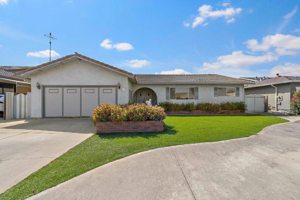 Nestled on a serene street in sought-after Almaden Valley, this home is being offered to the market for the very first time since it was built. Resting on an expansive lot with no direct rear neighbors, it combines peace and privacy with the convenience of nearby parks, public and private schools, shopping, dining, golf courses, and major commute routes. Inside, the thoughtfully designed floor plan offers comfort and versatility. A generous primary suite with a private ensuite bath and walk-in closet serves as a true retreat, while additional bedrooms and living areas flow seamlessly for everyday living and entertaining. The garage conversion provides a flexible space with its own kitchen and bath. Outdoors, the backyard offers plenty of room to enjoy and imagine with a workshop, accessory building, brick pizza oven, and mature fruit trees. This property presents a rare opportunity in one of Almaden Valley's most sought-after neighborhoods with endless potential for its next chapter.