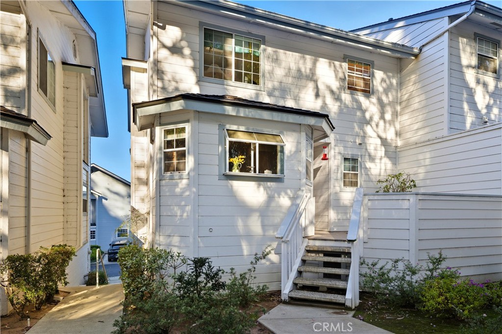 Take a look- then take another look.  Charming condo that feels like home - great kitchen with farmhouse sink and large window facing the golf course. Living room has a warm gas fireplace for the chilly nights. View from living room captures the bay, the ocean beyond and some beautiful sunsets.  House comes ready to move in - owner is only taking some personal things.
HOA includes a pool, spa and clubhouse.