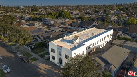 Photo of 1628 W 45th Street, Los Angeles, CA 90062 (MLS # 26666033)