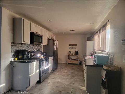 Photo of 1298 W 23rd St, San Bernardino, CA 92405 (MLS # MB25237893)