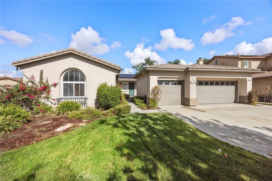 Welcome to this beautifully maintained single-story home nestled in the heart of Eastvale, perfectly situated at the end of a quiet cul-de-sac. Offering 2,591 sq ft of living space on a spacious 10,019 sq ft lot, this 4-bedroom, 2-bathroom home combines comfort, convenience, and elegance. Enter through a lushly landscaped courtyard into the formal entryway, which opens to a large living and dining room with views of the covered patio and private backyard—ideal for entertaining or relaxing. The separate family room features a cozy fireplace and seamlessly connects to the gourmet kitchen and casual dining nook. The spacious kitchen boasts a gas built-in cooktop, double self-cleaning ovens, microwave, refrigerator with ice maker (included), kitchen island, breakfast bar, walk-in pantry, and ample counter space. Enjoy the convenience of an indoor laundry room complete with a sink, cabinets, washer, and dryer—all included. The private master suite offers direct access to the backyard patio, a luxurious bathroom with a Jacuzzi tub, separate shower, double vanity, private toilet area, and a large walk-in closet. Three additional guest bedrooms share a full bathroom with a shower-over-tub. Additional features include: 10-foot ceilings with crown molding, Ceiling fans throughout,3-car attached garage. Located close to top-rated schools, shopping, public transportation, and major freeways. This is the single-story gem you've been waiting for—don't miss your chance to own this wonderful Eastvale home!  Home has leased solar system that can be assumed for 10 years, removed bu solar company or purchased from solar company.  Property listed as 3 bedroom in public records but is a 4 bedroom.