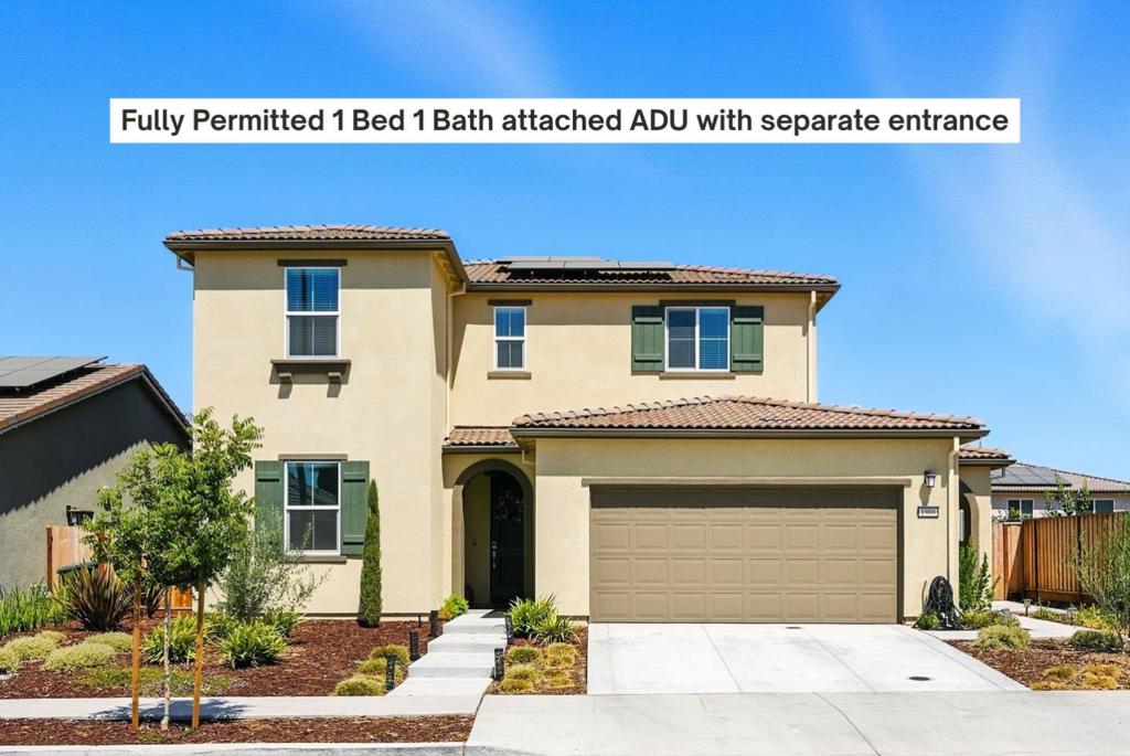 Built in 2024, this NextGen Lennar home provides more space without compromising privacy or independence. Spacious and modern ~3,232 square foot layout, on a ~5,948 square foot lot with a 3-car-garage. Main house has 4 bedrooms / 3 bathrooms and includes an attached, permitted 1 bedroom / 1 bathroom private suite. This ADU is part of the original builder floorplan, and is accessible through the kitchen or via separate exterior entrance. This 1/1 suite has it's own wet bar / kitchenette, living room, bedroom with ensuite bathroom, and laundry area. In the main home, 1 bedroom and 1 full bathroom are downstairs, as well as a large den / office. The other 3 bedrooms and 2 bathrooms are upstairs, along with the loft and laundry room. Primary bedroom has a walk-in closet and ensuite bathroom with an oversized tub and double sinks. The generously sized kitchen is equipped with quartz countertops, a built-in oven range with gas, dishwasher and microwave. The home is designed for comfort and convenience, with high ceilings, tons of storage and an open floorplan kitchen and family room. Enjoy the benefits of modern energy features like double pane windows, solar power, and a tankless water heater. Dual zone heat and AC. This beautiful home is priced to sell - come see it before it's gone!