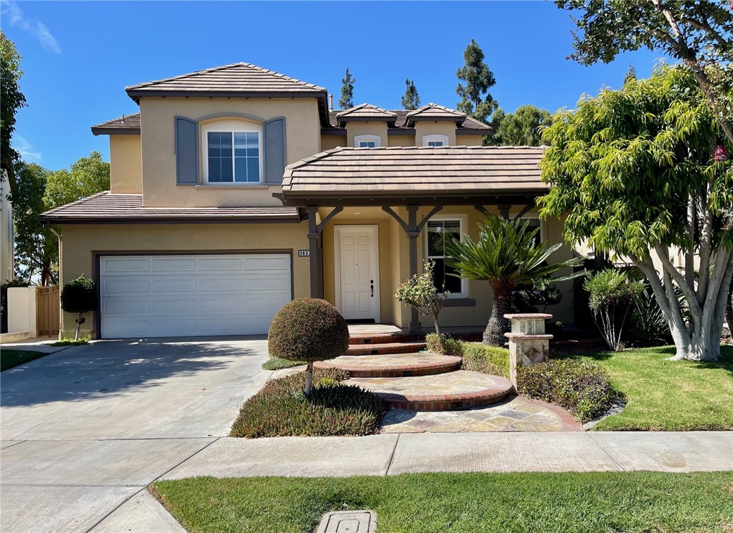 Premium Parkhurst Gated Community home south facing on a single loaded and cul-de-sac street. Freshly painted, Granite counters in the kitchen and bathrooms, first floor wood floors and new wood style floors upstairs, first floor bedroom and 3/4 bathroom, separate laundry room. Nice backyard with grass and patio with nice elevation with no neighbor seen from behind the home. 3 car tandem garage. Built in 2000 by Standard Pacific this home provides tall ceilings, concrete tile roof, recessed lighting, dual paned windows, garage for three cars with direct access and automatic sectional steel garage door. Located at Parkhurst gated community which includes wide tree lined streets and professionally landscaped pathways, three community pools, two spas, a club house, two tennis courts, putting green, a basketball court and play grounds. Located in the award winning Yorba Linda Placentia School District. Golden Elementary, Tuffree Middle School, & El Dorado High School. Close to Cal State Fullerton, Brea Mall and 57 Freeway. Walking distance to restaurants, Grocery stores and shopping.
